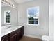 Bathroom with a single vanity and a large window providing natural light at 1555 Andora Dr, Rock Hill, SC 29732