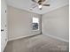 Cozy bedroom with neutral carpet, fresh paint, and natural light at 1555 Andora Dr, Rock Hill, SC 29732