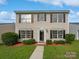 Charming two-story home with shutters, landscaped front yard, and inviting entrance at 1555 Andora Dr, Rock Hill, SC 29732
