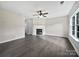 Spacious living room with ample natural light, ceiling fan, and open floor plan at 1555 Andora Dr, Rock Hill, SC 29732