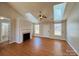 Open living space with hardwood floors, fireplace, and skylights providing ample natural light at 177 Highland Woods Ct, Denver, NC 28037