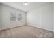 Bedroom featuring carpeted floors and a window that lets in lots of natural light at 2014 Mantle Ridge Dr, Indian Trail, NC 28079