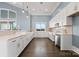 Spacious kitchen with ample counter space, white cabinets, and stainless steel appliances at 2014 Mantle Ridge Dr, Indian Trail, NC 28079
