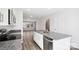 Modern kitchen featuring a spacious island, stainless steel appliances, and an open layout flowing into the living area at 225 Kennerly Ave # A, Mooresville, NC 28115