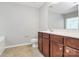 Bathroom featuring a large vanity, toilet, and tile flooring at 2313 Calabassas Ln, Matthews, NC 28105