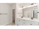 Bright bathroom features a double sink vanity, black hardware, and a large mirror at 237 Miramar Dr, York, SC 29745