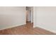 Spacious bedroom featuring hardwood floors, neutral walls, and a doorway leading to another room at 237 Miramar Dr, York, SC 29745