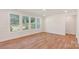 Bright and airy living space with hardwood floors, recessed lighting, and large windows overlooking the backyard at 237 Miramar Dr, York, SC 29745