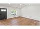 Bright bedroom features hardwood floors, natural light and recessed lighting at 2429 Ellen Ave, Charlotte, NC 28208