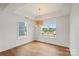 Bright bedroom featuring hardwood floors, recessed lighting and natural light at 2429 Ellen Ave, Charlotte, NC 28208