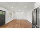 Inviting living area with hardwood floors, recessed lights, and stainless steel appliances at 2429 Ellen Ave, Charlotte, NC 28208