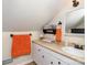 Upstairs bathroom featuring a long countertop, a sink, and wall mounted mirror at 306 W 2Nd St, Cherryville, NC 28021