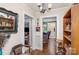 Hallway with hardwood floors leads to multiple rooms, showcasing decorative accents and an open layout at 306 W 2Nd St, Cherryville, NC 28021