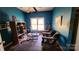 Living room showcasing seating area and natural light from windows at 3181 N Olivers Cross Rd, Newton, NC 28658