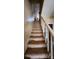Stairway leading upstairs, demonstrating the multi-level layout of the property and access to upper floors at 3181 N Olivers Cross Rd, Newton, NC 28658