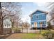 Charming blue home with a spacious fenced backyard at 331 Solomon St, Charlotte, NC 28216