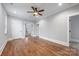 Large upstairs bonus room with hardwood floors, natural light and multiple entrances at 331 Solomon St, Charlotte, NC 28216