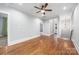 Spacious upper hall area with hardwood floors and natural light leading to multiple rooms at 331 Solomon St, Charlotte, NC 28216