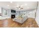 Bright living room features a fireplace, hardwood floors and neutral paint scheme at 331 Solomon St, Charlotte, NC 28216