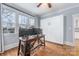Home office with hardwood floors, a built-in Murphy bed, and lots of natural light at 331 Solomon St, Charlotte, NC 28216