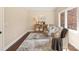 Charming sitting room with elegant chairs, stylish decor, hardwood floors, and a large window at 409 Running Horse Ln, Waxhaw, NC 28173