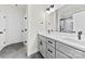 Bathroom featuring double sink vanity, modern fixtures, and a well-lit mirror at 412 W Westview St, Gastonia, NC 28052