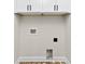 Room with cabinets, tiled floor and hookups for appliances at 412 W Westview St, Gastonia, NC 28052