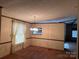 Dining room showcasing a chandelier, a large window, and carpet floors at 459 Towell St, Mooresville, NC 28115