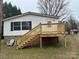 Well maintained home with a new wood staircase leading to a large deck at 459 Towell St, Mooresville, NC 28115