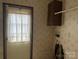 Laundry area with linoleum floors and textured walls at 459 Towell St, Mooresville, NC 28115