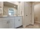 Bright bathroom with double sinks, and cabinets for ample storage at 502 Tayberry Ln, Fort Mill, SC 29715