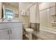 Bathroom with a white vanity, toilet, and shower/tub combination with a shower curtain at 502 Tayberry Ln, Fort Mill, SC 29715