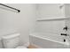 Bathroom features a tub and white subway tile surround at 520 Shoal Rd, Lincolnton, NC 28092