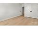 Bedroom features light hardwood floors and a closet at 520 Shoal Rd, Lincolnton, NC 28092