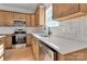 Modern kitchen featuring stainless steel appliances and a large sink at 520 Shoal Rd, Lincolnton, NC 28092