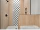 Modern shower showcasing unique tile work and contemporary fixtures at 520 Shoal Rd, Lincolnton, NC 28092