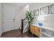 Bright entryway featuring wood floors, staircase, and decorative console table at 824 Imperial Ct, Charlotte, NC 28273