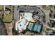 Aerial view of community amenities, including pools, tennis courts, and playground, enhancing lifestyle at 841 Wandering Way Dr, Waxhaw, NC 28173