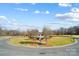 Well-manicured green space with walking paths and a fountain, providing a tranquil setting at 841 Wandering Way Dr, Waxhaw, NC 28173