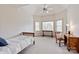 Spacious bedroom with vaulted ceiling and large windows providing ample natural light at 9901 Strike The Gold Ln, Waxhaw, NC 28173