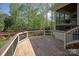 Expansive wooden deck offering scenic views and ample space for outdoor enjoyment at 9901 Strike The Gold Ln, Waxhaw, NC 28173