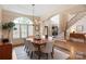 Charming dining room featuring hardwood floors and natural light at 9901 Strike The Gold Ln, Waxhaw, NC 28173