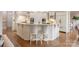 Elegant kitchen island with ample counter space and seating at 9901 Strike The Gold Ln, Waxhaw, NC 28173