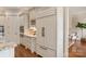 Well-appointed kitchen featuring built-in refrigerator, custom cabinetry, and convenient access to the dining area at 9901 Strike The Gold Ln, Waxhaw, NC 28173