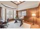 Spacious office with custom wood paneling and bright windows at 9901 Strike The Gold Ln, Waxhaw, NC 28173