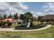 Community playground featuring slides, climbing structures, and a shaded picnic area for Gathering fun at 9901 Strike The Gold Ln, Waxhaw, NC 28173