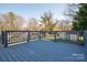 Back deck features a painted blue wood and railing, perfect for relaxing or entertaining at 116 Garrison Dr, Belmont, NC 28012