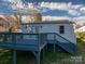Back of house featuring walk out deck at 116 Garrison Dr, Belmont, NC 28012
