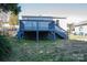 Back deck has stairs leading to the backyard at 116 Garrison Dr, Belmont, NC 28012