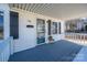 Inviting front porch with decorative mailbox, accent lighting, and decorative gray shutters at 116 Garrison Dr, Belmont, NC 28012